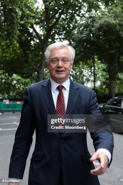 David Davis, U.K. Exiting the European Union secretary, walks in-between doing media interviews in London, U.K., on Tuesday, Aug. 15, 2017. The U.K....