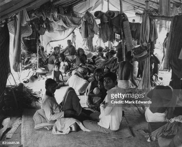 Refugees in a makeshift camp at Bongaon, fleeing fighting on the border between India and Pakistan during the Bangladesh Liberation War, 26th June...