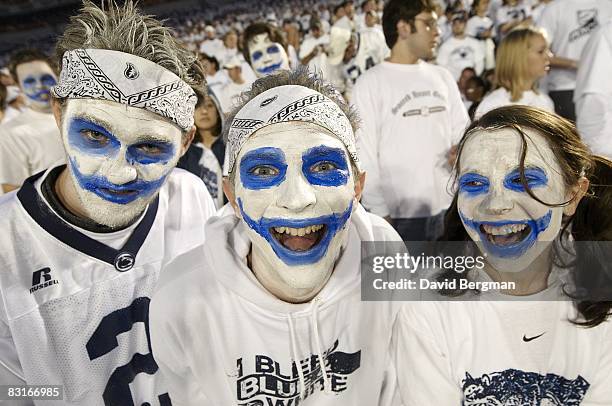 Closeup of Penn State painted fans dressed for 'White Out' game in stands during game vs Illinois. University Park, PA 9/27/2008 CREDIT: David Bergman