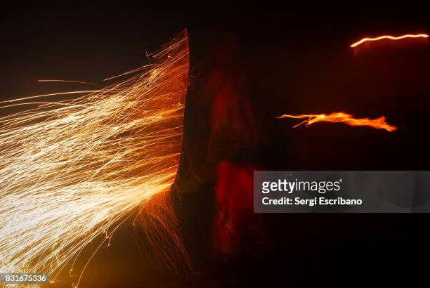 explosion of a firecracker - correfoc stock pictures, royalty-free photos & images