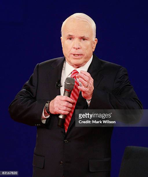 Republican presidential candidate Sen. John McCain speaks during the debate with Democratic presidential candidate Sen. Barack Obama speak during the...