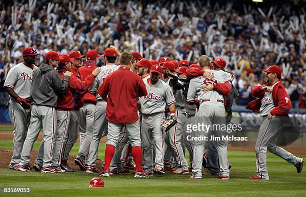 The Philadelphia Phillies celebrate after the final out against the Milwaukee Brewers in game four of the NLDS during the 2008 MLB playoffs at Miller...