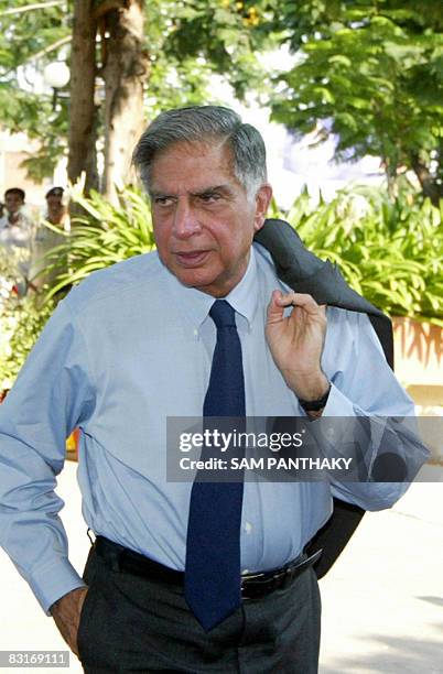Chairman of Indian auto makers Tata Motors, Ratan Tata arrives at a hotel in Ahmedabad on October 7, 2008. India's Tata Motors signed an agreement to...