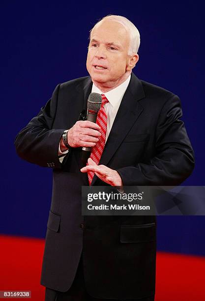 Republican presidential candidate Sen. John McCain speaks during the debate with Democratic presidential candidate Sen. Barack Obama at the Town Hall...