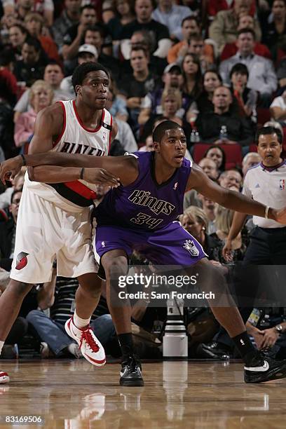 Jason Thompson of the Sacramento Kings blocks out Ike Diogu of the Portland Trail Blazers during a game on October 7, 2008 at the Rose Garden Arena...