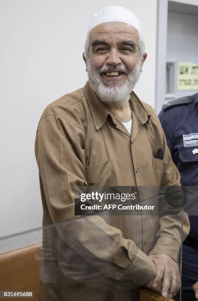 Arab-Israeli Sheikh Raed Salah , leader of the radical northern branch of the Islamic Movement in Israel, smiles as he arrives at the Israeli Rishon...