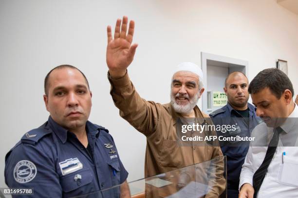 Arab-Israeli Sheikh Raed Salah , leader of the radical northern branch of the Islamic Movement in Israel, smiles as he arrives at the Israeli Rishon...