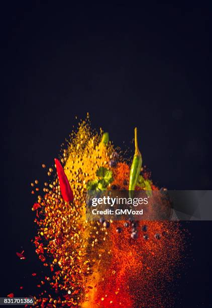 chili spice mix food explosion - seasoning mid air stock pictures, royalty-free photos & images