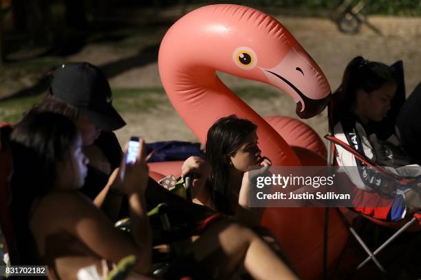 Local residents hang out on Tumon Beach on August 15, 2017 in Tamuning, Guam. The American territory of Guam remains on high alert as a showdown...