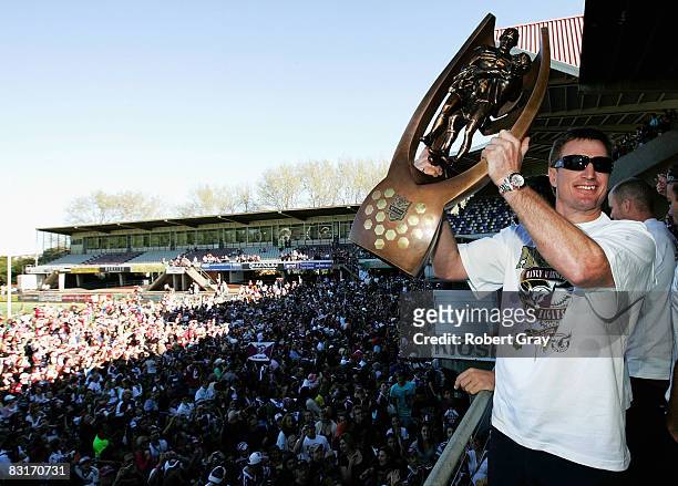 Steve Menzies of the Sea Eagles poses for a photo with the trophy at the Fan Day Carnival following the Manly Sea Eagles NRL Grand Final Victory...