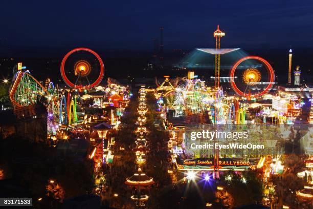 General view over the Oktoberfest beer festival on the Theresienwiese, seen from the clock tower of St. Paul's Church at night on October 5, 2008 in...