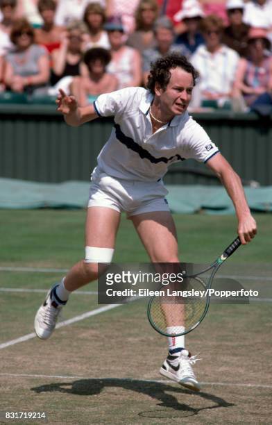 John McEnroe of the USA in action during a men's singles match at the Wimbledon Lawn Tennis Championships in London, circa July 1985. McEnroe was...