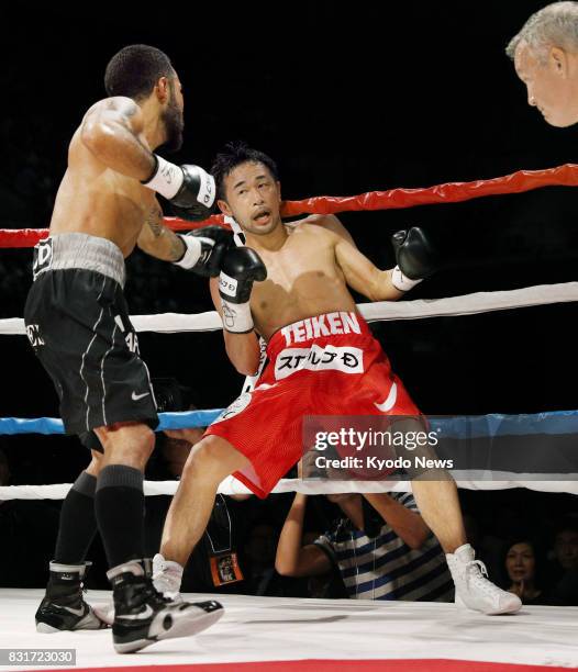 Japanese boxer Shinsuke Yamanaka is worked against the ropes by Luis Nery of Mexico in the fourth round of their WBC bantamweight title match at...