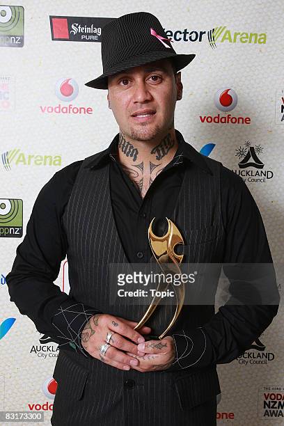 Tiki Taane poses with the award for Best Aotearoa Roots Album for Past, Present, Future backstage at the Vodafone New Zealand Music Awards 2008 at...