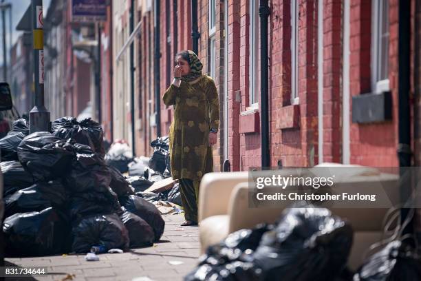 Household rubbish begins to pile high on the streets of Alum Rock in Birmingham as the refuse collector strike enters its sixth week on August 15,...