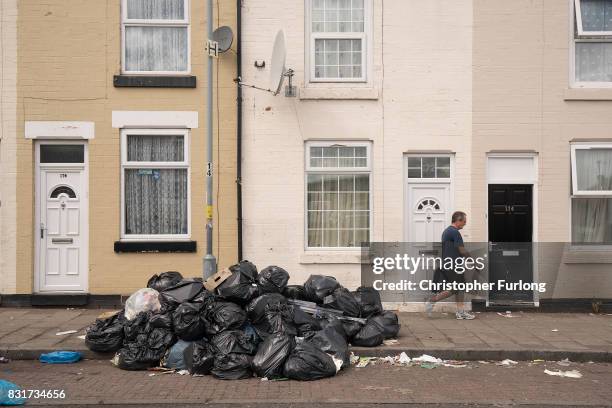 Household rubbish begins to pile high on the streets of Alum Rock in Birmingham as the refuse collector strike enters its sixth week on August 15,...