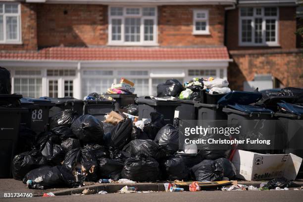 Household rubbish begins to pile high on the streets of Alum Rock in Birmingham as the refuse collector strike enters its sixth week on August 15,...