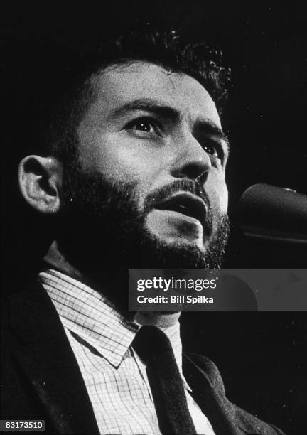 American journalist, novelist and critic Nat Hentoff speaks into a microphone, circa 1960.