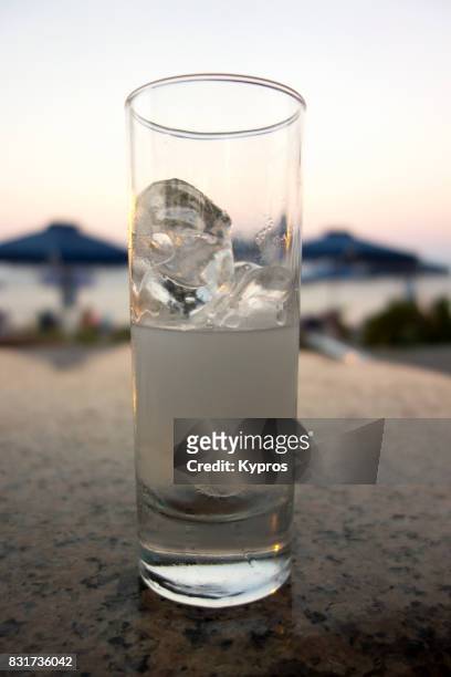 europe, greece, rhodes island, view of glass of ouzo - ouzo stock pictures, royalty-free photos & images
