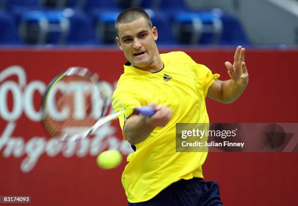 Mikhail Youzhny of Russia plays a forehand in his match against Teimuraz Gabashvili of Russia during day three of the Kremlin Cup Tennis at the...