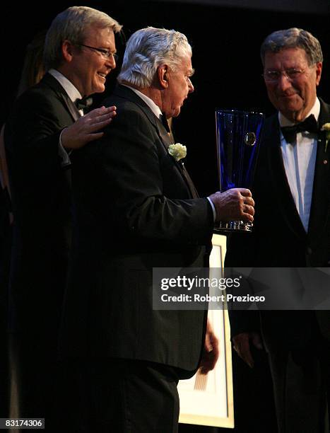 Kevin Rudd, Prime Minister, congratulates Bart Cummings as he becomes a Legend Inductee during the 24th Sport Australia Hall Of Fame Dinner and...