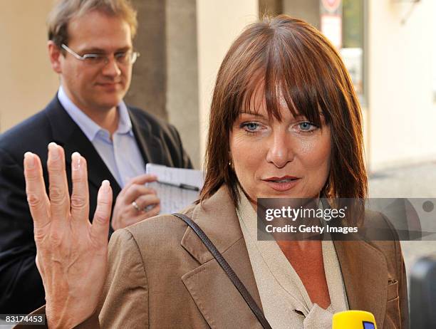 Gabriele Pauli, member of the party Freie Waehler, speaks to the media beside a meeting of the CSU fraction at the Bavarian Parliament on October 8,...