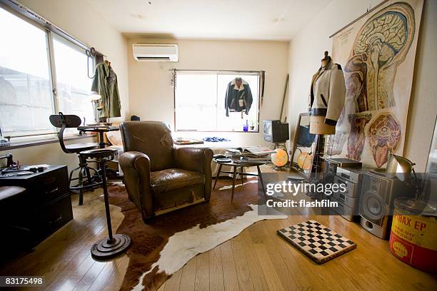 image of japanese man's apartment - man cave stock-fotos und bilder