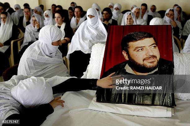 Fmale family members and friends mourn next to the body of Lebanese Druze opposition politician Saleh Aridi on September 11, 2008 in the village of...