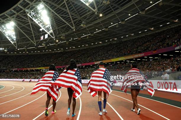 Quanera Hayes, Allyson Felix, Shakima Wimbley and Phyllis Francis of the United States celebrate winning gold in the Women's 4x400 Metres Relay final...