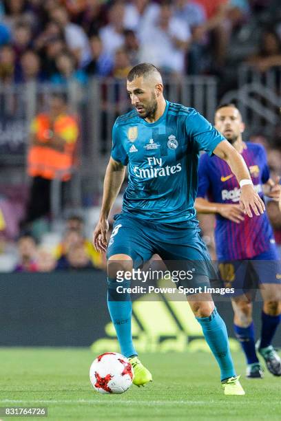 Karim Benzema of Real Madrid in action during the Supercopa de Espana Final 1st Leg match between FC Barcelona and Real Madrid at Camp Nou on August...