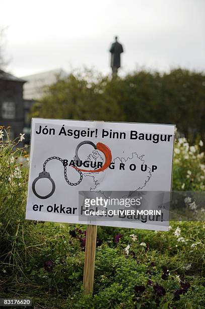 Placard criticizing Jon Asgeir, owner of many investment compagnies in Iceland, is pictured in front of the parliament in Reykjavik on October 8,...