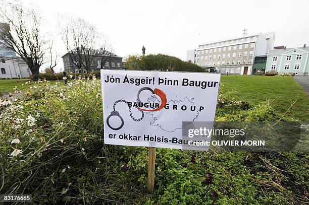 Placard criticizing Jon Asgeir, owner of many investment compagnies in Iceland, is pictured in front of the parliament in Reykjavik on October 8,...