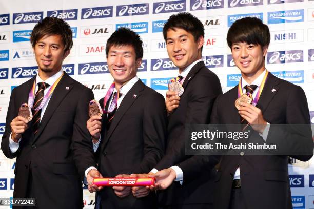 World Athletics Championships Men's 4x100 metres relay bronze medalists Kenji Fujimitsu, Yoshihide Kiryu, Shota Iizuka and Shuhei Tada pose for...