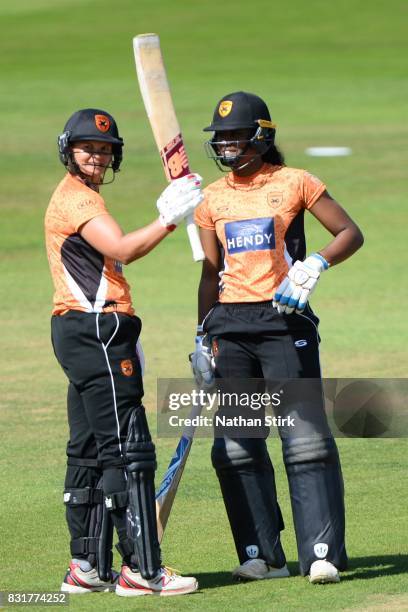 Suzie Bates of Southern Vipers raises her bat after scoring 50 runs during the Kia Super League 2017 match between Loughborough Lightning and...