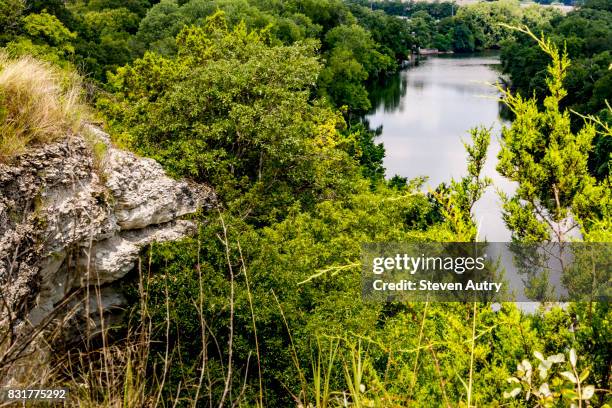 waco, texas, usa - aug 4, 2017:  the brazos river and texas hill country beyond, as seen from the area of cameron park cliffs known as emmons cliff. - waco stock-fotos und bilder