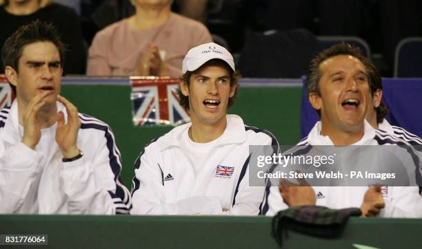 Andrew Murray watches the match between Great Britain's Greg Rusedski and Serbia & Montenegro's Janko Tipsarevic during the first day of the Davis...