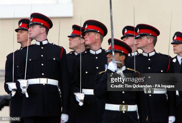 Prince Harry takes his place in The Sovereign's Parade at the Royal Military Academy at Sandhurst in Surrey to mark the completion of his officer...