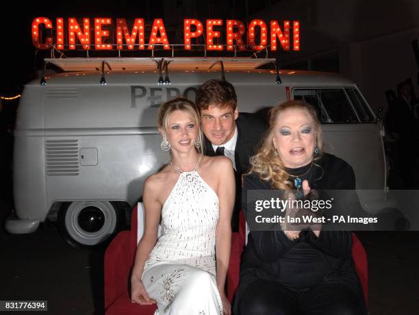 Landi Swanepoel Reuben Quesada and Anita Ekberg arrive at the launch of the new Peroni Nastro Azzurro advert, at the Design Museum, central London,...