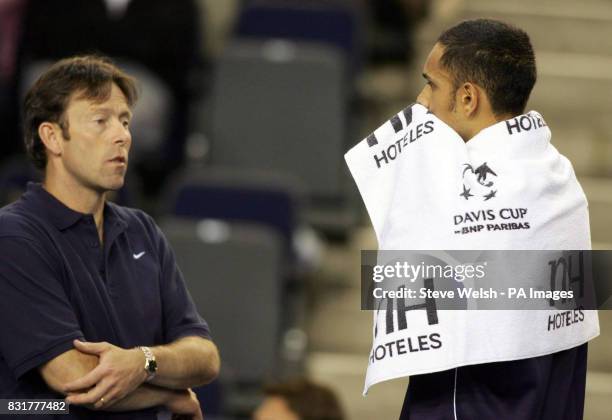 Great Britain captain Jeremy Bates gives some advice to Arvind Parmar during the Davis Cup match against Serbia & Montenegro's Novak Djokovic at the...