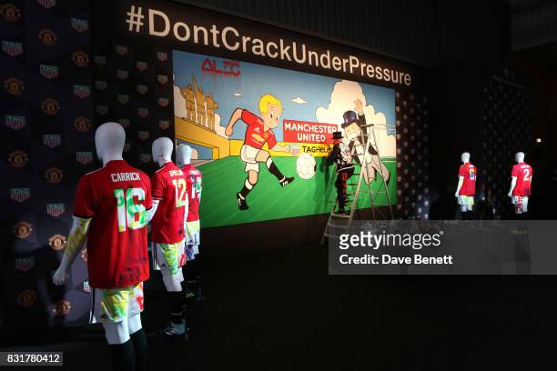 Heuer Art Provocateur Alec Monopoly works on new artwork at Old Trafford on August 15, 2017 in Manchester, England.