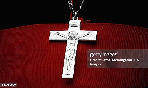 The cross worn by the Archbishop Of Westminster, Cormac Murphy O'Connor, as he gives the annual Good Friday service at Westminster Cathedral, London.
