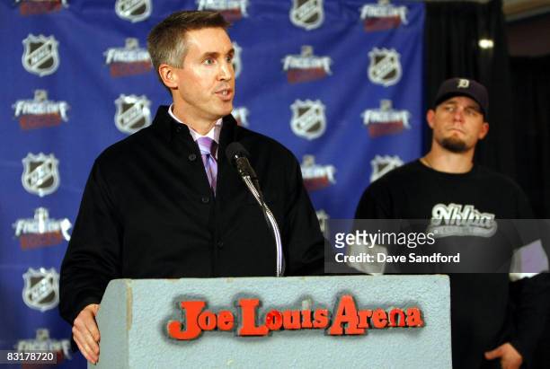 Darren McCarty of the Detroit Red Wings looks on as NHL EVP of Marketing Brian Jennings talks about NHL Face-Off Rocks to the media in a press...