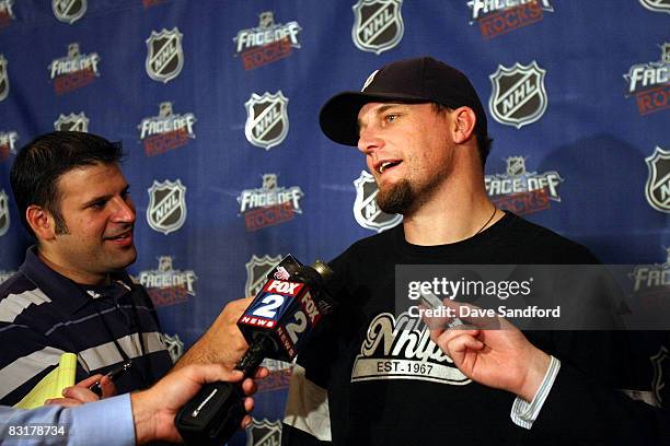 Darren McCarty of the Detroit Red Wings talks about NHL Face-Off Rocks to the media in a press conference at Joe Louis Arena October 8, 2008 in...