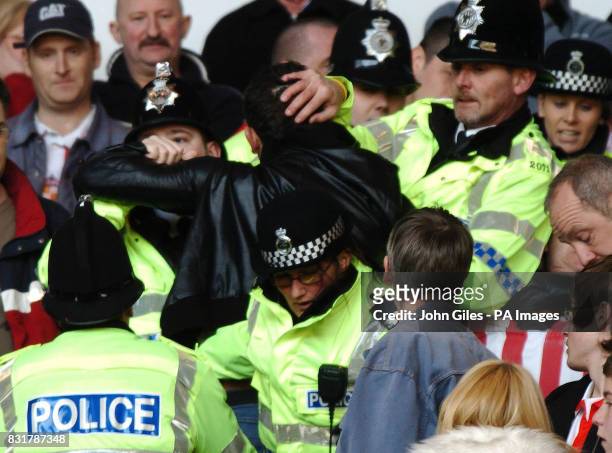 Police move in to stop trouble in the crowd during the Barclays Premiership match between Sunderland and Newcastle United at the Stadium of Light,...