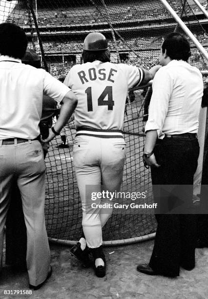 American baseball player Pete Rose, of the Cincinatti Reds, watches batting practice on the field before a game at Shea Stadium in Flushing...