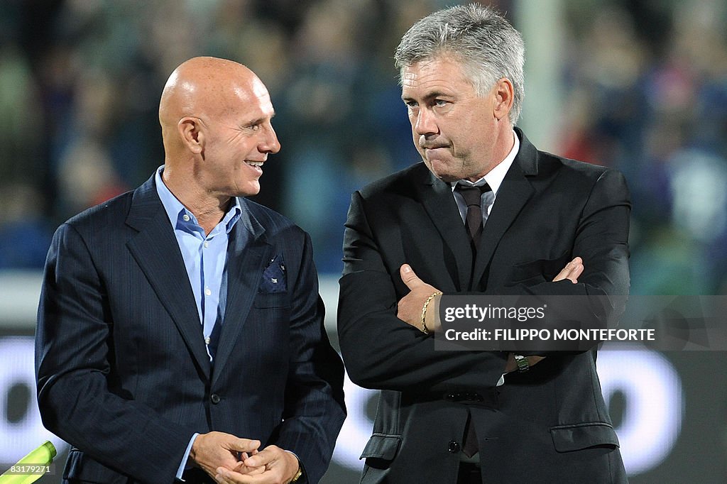 AC milan's coach Cerlo Ancellotti (R) ta