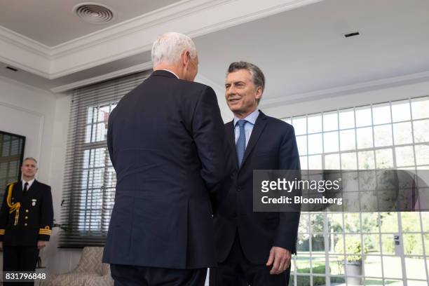 Mauricio Macri, Argentina's president, right, shakes hands with U.S. Vice President Mike Pence at the presidential residence in Olivos, Argentina, on...