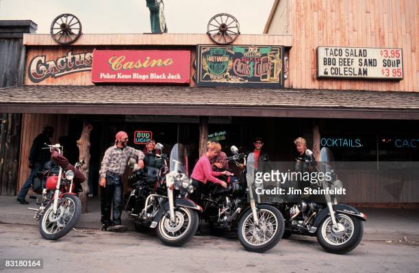 50th Anniversary of the World Famous Sturgis Motorcycle Rally. Bikers standing in front of the Cactus Lounge in Sturgis, South Dakota on August 6,...