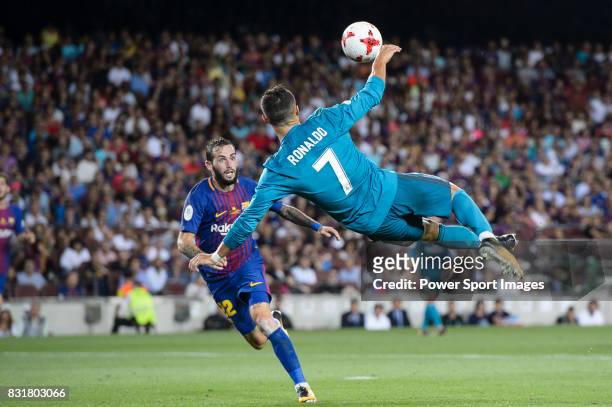 Cristiano Ronaldo of Real Madrid attempts a bicycle kick during the Supercopa de Espana Final 1st Leg match between FC Barcelona and Real Madrid at...
