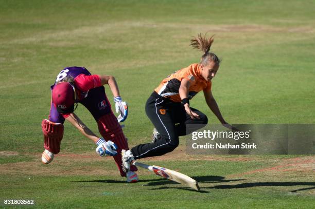 Tash Farrant of Southern Vipers and Ellyse Parry of Loughborough Lightning run into each other during the Kia Super League 2017 match between...
